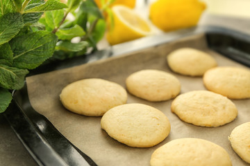 Homemade cookies with lemon flavor on baking tray