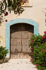 Fototapeta na wymiar Traditional wooden painted blue door in Malta