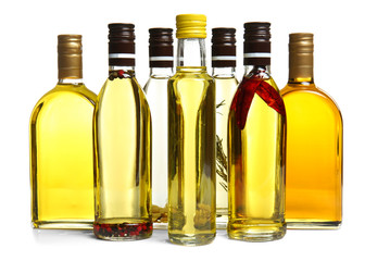 Bottles of cooking oil, isolated on white