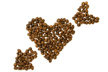 Heart is laid out coffee beans on white