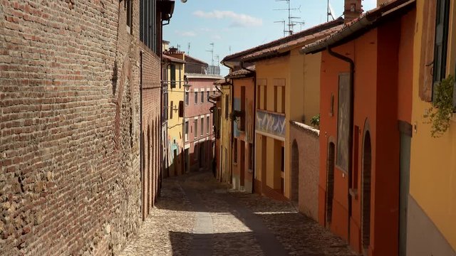 shot of cobbled street of the medieval village of Dozza, a small gem among the architectural wonders of Italy