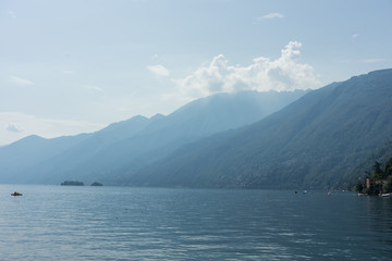 Lago Maggiore Lake with fog and Mountain landscape in Ascona Switzerland