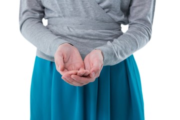 Teenage girl pretending to hold invisible object