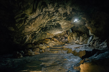 Fototapeta na wymiar Tunnel inside a large underground cave
