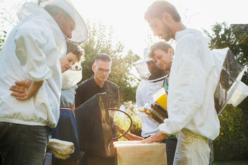 Apiculture Workshop - Beekeeping Students With Teacher Around Beebox