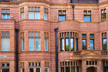  Elite properties of London. Facade of residential buildings in the Kensington, one of the most expensive places to live in UK. London. Gloucester street.