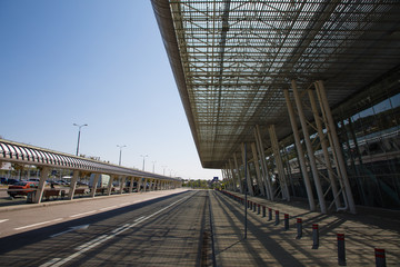 Road and modern building architecture of International airport terminal in Lviv, Ukraine
