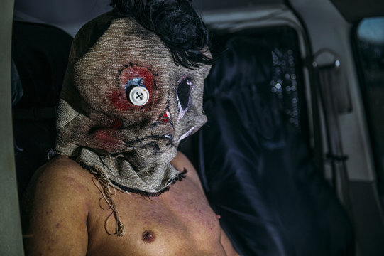 Person in horrifying mask