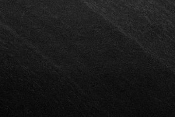Dark grey black slate background or texture.