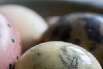 Light rextures marble ball with blurred balls in the background