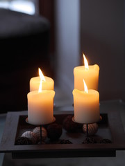 Fototapeta na wymiar Four candles burning