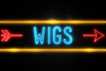 Obraz premium Wigs - fluorescent Neon Sign on brickwall Front view