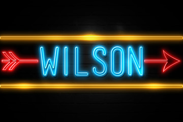 Wilson  - fluorescent Neon Sign on brickwall Front view