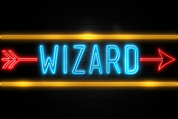 Fototapeta na wymiar Wizard - fluorescent Neon Sign on brickwall Front view