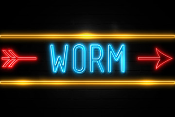 Worm  - fluorescent Neon Sign on brickwall Front view