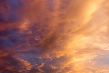Beautiful clouds at sunset, improbable sky