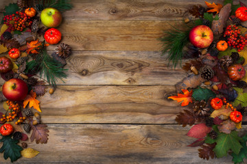 Rustic Thanksgiving decoration with pumpkins and cones