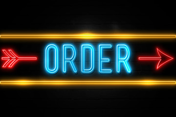 Order  - fluorescent Neon Sign on brickwall Front view