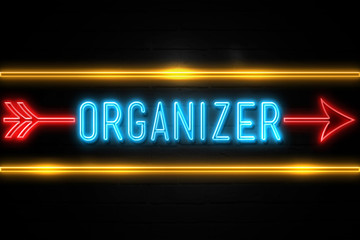 Organizer  - fluorescent Neon Sign on brickwall Front view