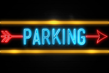 Parking  - fluorescent Neon Sign on brickwall Front view