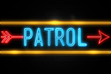 Patrol  - fluorescent Neon Sign on brickwall Front view
