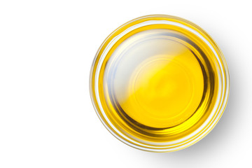A bowl of olive oil isolated on white background