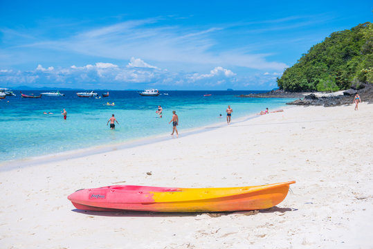 Tourists Relaxing On The Beach Of The Banana Beach, Coral Island, Koh Hey In Phuket