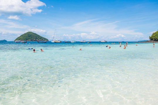 Tourists Relaxing On The Beach Of The Banana Beach, Coral Island, Koh Hey In Phuket