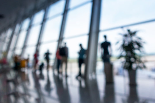 Abstract blurred in airport terminal, Travelers tourist waiting at boarding gate before departure