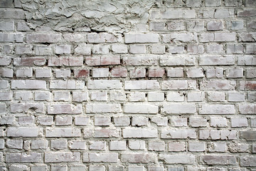 Old brick wall with white