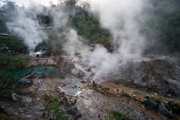 Fototapeta na wymiar Kawah Cibuni (Rengganis) - Hot Springs inside crater of volcano, near famous landmark Kawah Putih, Ciwidey, Bandung, Indonesia