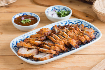Deep Fried Crispy Pork Belly Cooked with Garlic and spicy dipping sauce