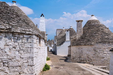 Alberobello (Italy) - The incredible little white town in Apulia region, province of Bari, southern Italy, famous for its unique trulli buildings. Here the historic center in a summer day