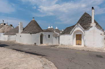 Alberobello (Italy) - The incredible little white town in Apulia region, province of Bari, southern Italy, famous for its unique trulli buildings. Here the historic center in a summer day