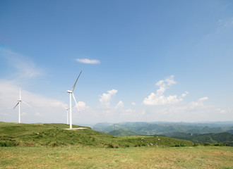 Fototapeta na wymiar wind power on the hilltop