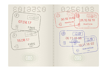 Naklejka premium Passport pages with international stamps