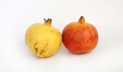 ripe pomegranate fruits isolated on white background.