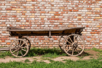 Fototapeta na wymiar Old vintage wooden cart. Traditional wooden cart