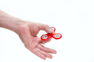 red spinner on hand and white background