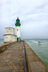 Fototapeta na wymiar Lighthouse at the entrance to le Treport Harbour