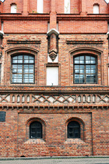 Red brick gothic house in Pilies Street in Vilnius, Lithuania.