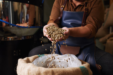 Showing green coffee beans