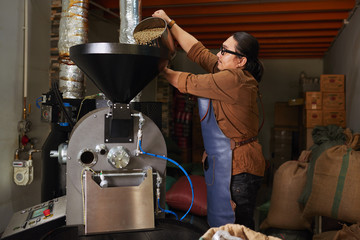 Loading roster with coffee beans
