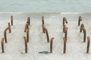 detail of curved metal rods on seaside