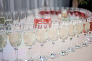 Many glasses of champagne in the restaurant, close-up