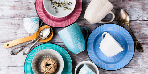 Ceramic crockery tableware on wooden background. Pastel vintage color bowls, dishes, cups - 170810208