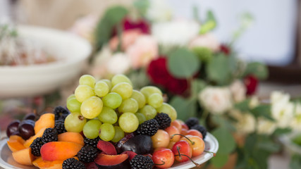 Table of the bride and groom in the restaurant. Wedding decor, flowers