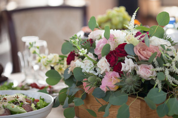 Wedding decor. Flowers in the restaurant, food on the table