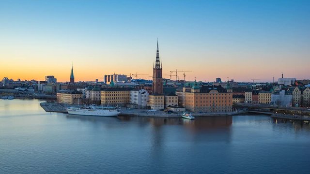 Day to Night video time lapse of Stockholm city skyline Gamla Stan timelapse, video 4K