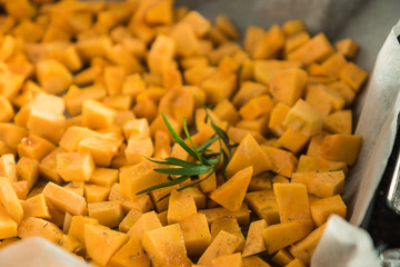 Sliced, ​​raw pumpkin prepared for baking